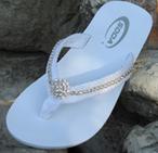 Whiite flat flip flops with fabric straps lined with rhinestones for wedding